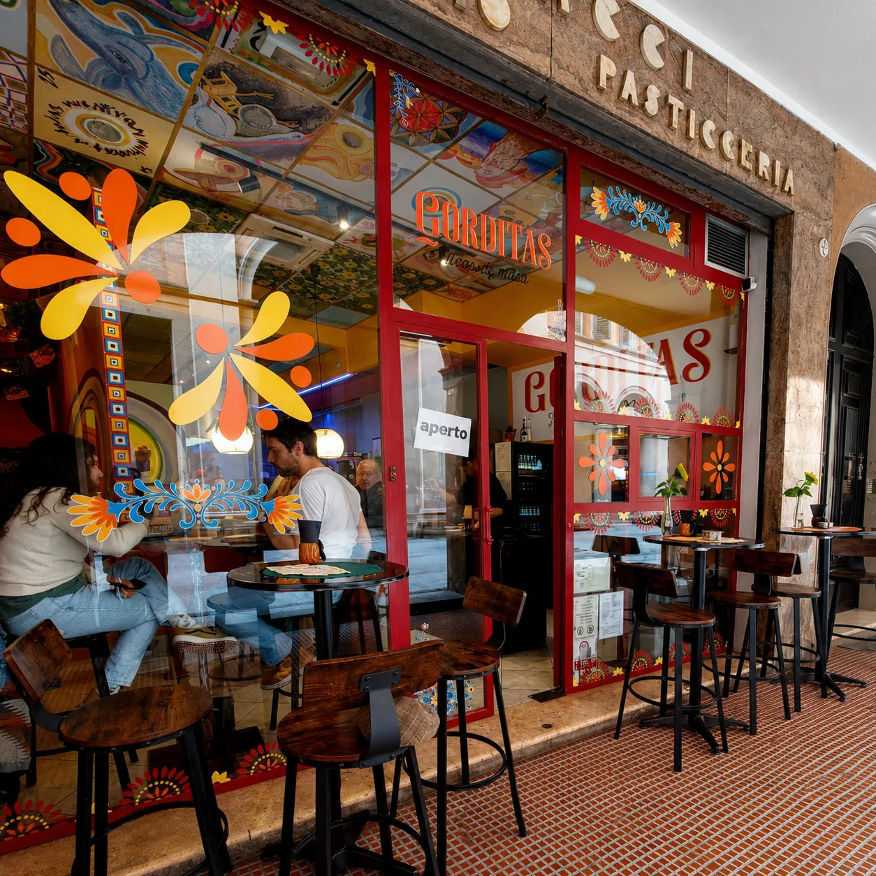 Gorditas restaurant exterior and dining room window.